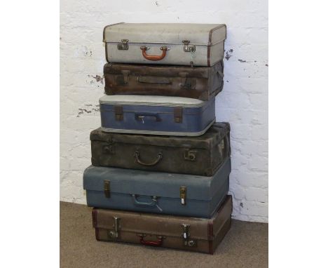 A collection of six vintage suitcase.