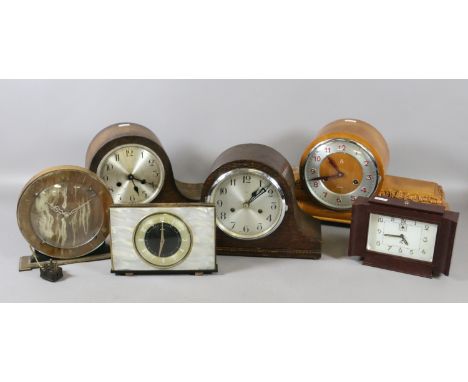 Six 1940-50 mantel clocks including two oak cased eight day examples, a Bakelite cased clock and an Art Deco electric clock.