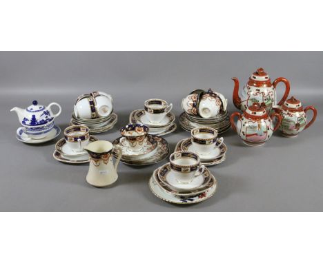 A Royal Albert Crown China tea service decorated in the Trigo pattern, another Royal Albert tea service (approximately forty/