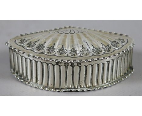 A Victorian Aesthetic Movement silver snuff box by Nathan & Hayes with crimped edges and reeded sides, gilt interior and chas