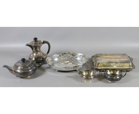 A silver plated four piece tea service, entree dish and pierced basket with swing handle.