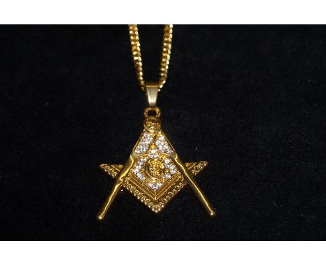 Yellow metal Masonic chain and pendant. Chain length 70cm total weight 32.4 grams