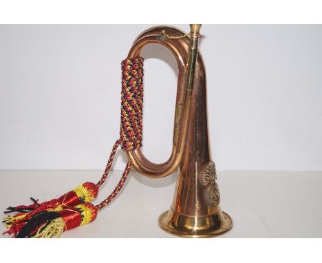Brass army bugle.