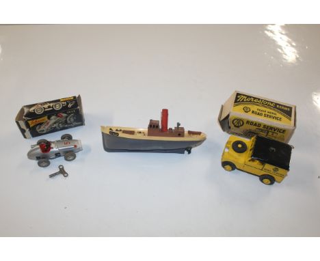 A boxed scale model AA Road Surface vehicle; and a Schuco micro racer 1043; and a Penguin toy trawler AF