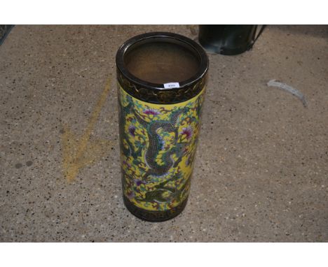 A Chinese yellow dragon decorated stick stand 