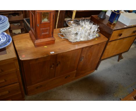 An Ercol sideboard (cupboard door handle AF)