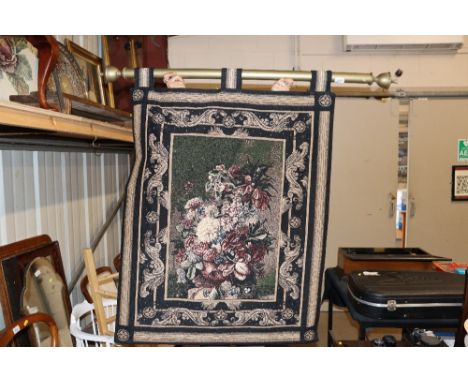 A tapestry effect wall hanging with pole 