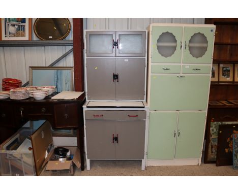 A vintage kitchen unit with enamelled pull out shelf 