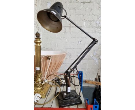 A black Herbert Terry &amp; Sons Anglepoise lamp with two step base. 