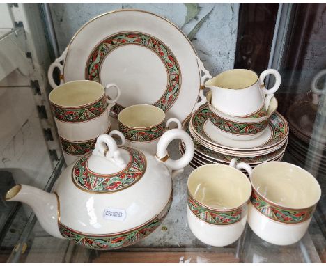 A Belleek tea set, celtic design, 19 pieces in total.&nbsp;Condition - one saucer with chip/hairline to rim, one plate with s