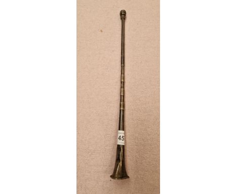 A hallmarked silver model post horn. 