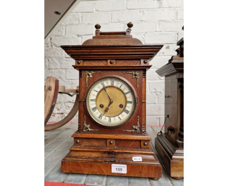 A late 19th century architectural mantel clock.Note:- Pendulum present.