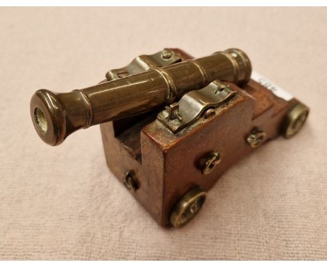 A miniature model cannon. 