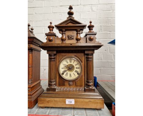 A late 19th century architectural mantel clock.Note:- Pendulum present.
