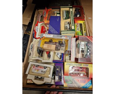 A crate of boxed model cars including Corgi, Matchbox, Lledo etc 