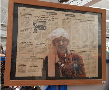 Random (aka the Barnsley Banksy), street art, mixed media, portrait of a Middle Eastern man, painted on Arabic newspaper, 71c