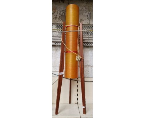 A mid century rocket lamp, teak legs, acrylic shade, 110cm height. 