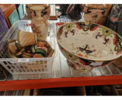 A mixed lot comprising two Royal Worcester baskets, a Carlton Ware vase and a Royal Doulton Matsumai bowl, and plastic egg cu