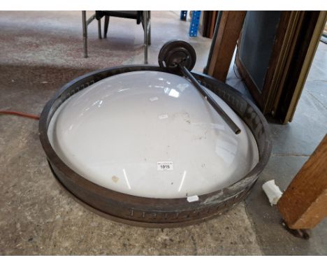 A large metal light fitting originally from BHS in Southport.