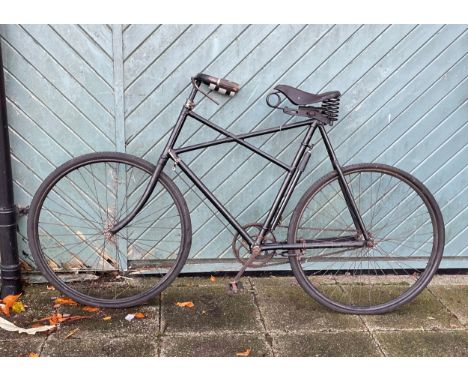A Centaur 'Feather Light' or Components Ltd Gentleman's Roadster black enamelled bicycle, c.1910, with associated tyre pump, 