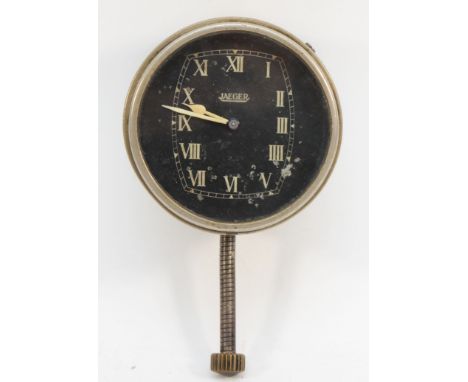 A vintage brushed metal cased Jaeger car clock, the black dial with white Roman numerals, outer case impressed 254478