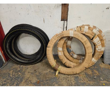 Four Michelin veteran bead edge tyres, 650/65, a pair of Dunlop Clipper 26 - 2 1/4 tyres, and a pair of Thai bead edge 26 2 a