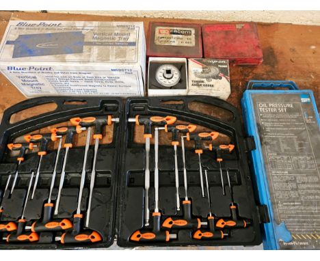 A Snap On torque angle gauge, a Blue Planet magnetic tray and other tools 