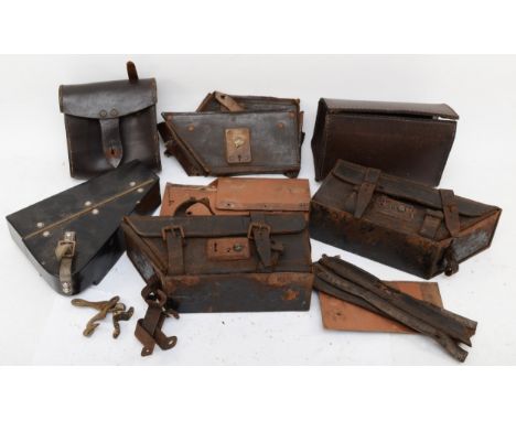 A pair of vintage metal and leather toolboxes in original condition, a leather toolbox in parts along with three other tool b