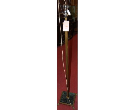 A circa 1900 brass Corinthian column standard lamp