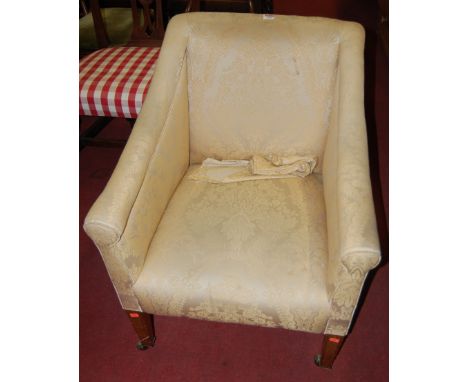 A late 19th century light oak framed and pale floral upholstered armchair