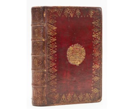 Binding.- The Book of Common Prayer, ruled throughout in red, occasional spotting, contemporary red morocco, gilt, covers wit