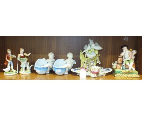 A pair of San Marco Capo-di-Monte figures of a young boy and girl feeding ducks, 15cm high and four other ceramic ornaments, 