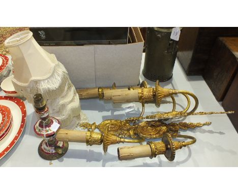 Three modern gilt metal two-branch wall light fittings, 40cm high and a ceramic table lamp, (4).