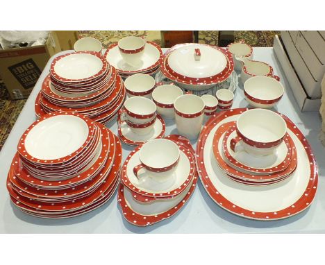 Seventy-three pieces of 1950's Midwinter Stylecraft shape tea and dinnerware in the "Red Domino" pattern by Jessie Tait, (73)