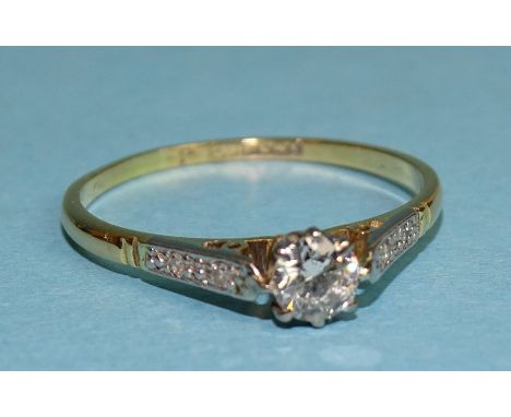 A solitaire diamond ring claw-set a brilliant-cut diamond of approximately 0.35cts, between 8/8-cut diamond-set shoulders, in