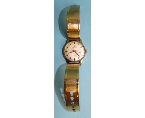 Zenith, a gentleman's 9ct-gold-cased automatic wrist watch, the silvered dial with baton numerals, centre-sweep seconds and d