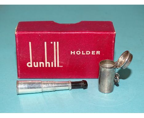 A Dunhill "The White Spot" telescopic cigarette holder, (48mm extended), in silver case 23mm long, London 1951, (in original 