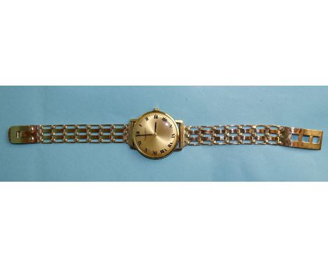 A gentleman's 9ct gold IWC wrist watch, the gilt dial marked International Watch Co, Schaffhausen, with Roman numerals, the b