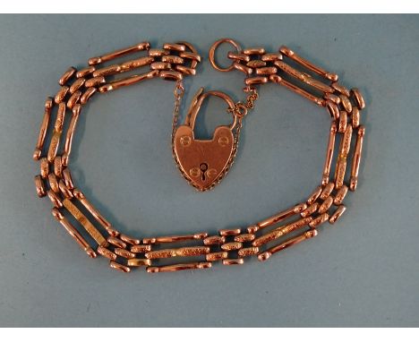 A 9ct rose gold gate-link bracelet with padlock clasp, 20cm long, 12.5g. 