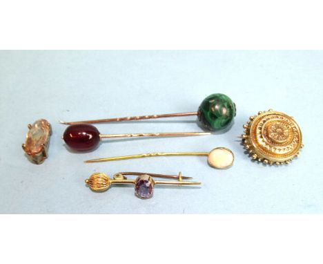 A 9ct gold stick pin set opal, two other stick pins, an amethyst brooch and other items. 