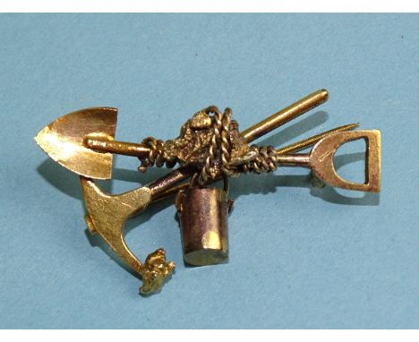 A 9ct yellow gold "gold prospector' brooch formed as a spade, pick, bucket, rope and nuggets, marked '9ct', 38mm, 4.5g. 