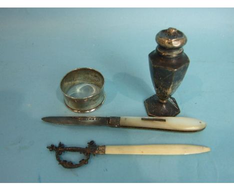 A silver-bladed mother-of-pearl-handled folding fruit knife, a silver pepperette (a/f), napkin ring and a letter opener, weig