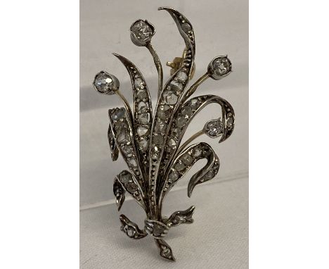 A vintage 9ct gold and diamond floral Tulip spray design brooch. Set with 43 varying size diamonds. Tests as 9ct gold. Total 