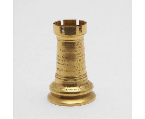 in the form of a rook, the top inset with a section of Transatlantic telegraph cable, inscribed "CHESS MATCH BY CABLE BETWEEN