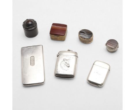 with a suspensory ring and decorated on the front with a dog and embossed with "PRESENTED BY T H STRETCH", maker's mark "T.O"