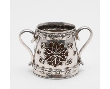 of tapering form, with twin scroll handles, punched borders and decorated with orangey/ brown enamel on both sides, by John F