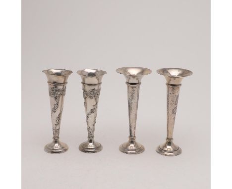 one pair with textured bodies, by Walker &amp; Hall, Sheffield 1907, the other pair with embossed decoration, by William Comy