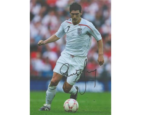 Gareth Barry signed 12x8 colour photo. Barry (born 23 February 1981) is an English former professional footballer who played 