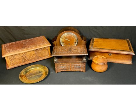 An early 20th century oak stationery box, the interior with well and pen aperture, c.1910;  a 1930 oak mantel clock;  a minia