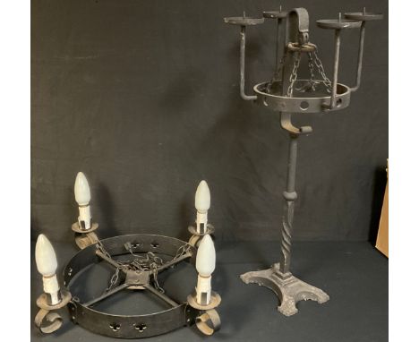 A wrought iron Gothic style four branch electrolier, approx. 61cm wide; a similar floor standing four branch pricket candlest